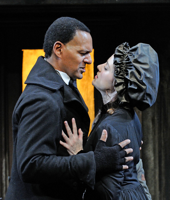 Erick Pinnick as Mr. Sowerberry with Lauren Gemelli as Mrs. Sowerberry in 2014's Oliver! Photo by Mark Turek